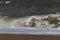 Sea waves at Ban Krut Beach in monsoon season