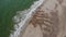 Sea waves on beautiful beach. Aerial view drone. Amazing nature background