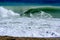 Sea waves breaking near beach