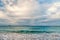 Sea waves on cloudy sky in philipsburg, sint maarten. Seascape and sky with clouds, white cloudscape. Beach vacation at