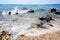 Sea waves that flooded the coast on the pebble beach