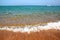 Sea waves and gold sand beach