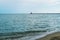 Sea waves at Odessa beach with lighthouse