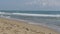 The Sea Waves are Rolling on a Sand Beach