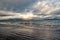 Sea waves on sandy beach in reykjavik, iceland. Seascape with grey water on cloudy sky. Power of nature. Wanderlust or