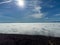 Sea of white clouds above Rioja Alavesa valley as seen from sunny point of view Balcon De La Rioja, Spain in winter