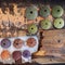 Sea worn wood pieces and colorful sea urchin shells top view closeup.