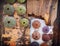 Sea worn wood pieces and colorful sea urchin shells top view closeup