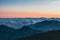 sea â€‹â€‹of â€‹â€‹clouds surrounded by mountains in the afternoon