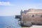 Seacoast near Castello Maniace â€“ ancient castle in Ortygia Ortigia Island, Syracuse, Sicily, Italy, traditional architecture