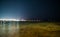 Seacoast view at summer night with sail boats