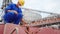 Seafarer checks protective lead seal to safely lock cargo holds with wheat on bulker ship at sea grain terminal in