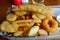 Seafood basket with battered fish fillet and crumbed prawn