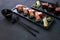 Seafood delicatessen sushi rolls set on plates