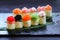 Seafood delicatessen, sushi rolls set on slate