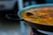 Seafood paella in its paella pan