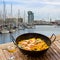 Seafood paella in seaside cafe, Barcelona