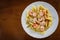 Seafood pasta in sweet and sour sauce