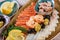 Seafood platter. Fresh cod liver, salmon, shrimp, slices fish fillet, decorated with herb