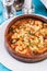 Seafood stew soup- shrimp, fish meat and mushrooms, with cheese and greens