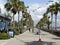 Seafront promenade with flag garlands and traffic cones