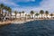 The seafront promenade and port in Fornells, Menorca, Spain