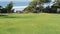 Seagrove park in Del Mar, California USA. Seaside lawn. Green grass and ocean view frome above.