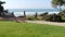 Seagrove park in Del Mar, California USA. Seaside lawn. Green grass and ocean view frome above.