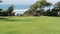 Seagrove park in Del Mar, California USA. Seaside lawn. Green grass and ocean view frome above.