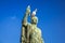 Seagull on the bronze Caesar statue at Trajan Market in Rome, Italy