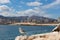 Seagull in Calpe Spain with town and seafront hotels and apartments in background