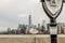 A Seagull Enjoying Manhattan Cityscape View Near a Coin Operated Binoculars. New York City