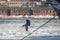 Seagull flies over the frozen Bay Golden hornin Vladivostok