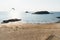 Seagull flying over the empty beach of Saint Malo