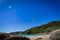 Seagull flying in the sky at Fairy Cove beach at Wilson Promontory Victoria Australia