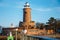 Seagull in the  harbor and the lighthouse in Kolobrzeg