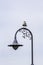 Seagull on an old lamp post at Fishermans Warf