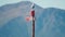 A seagull perched on the fairway navigation marker