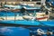 Seagull relaxing on blue boat sundeck in Piran marina