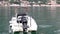 The seagull stands on a speedboat Kotor bay