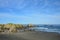 Seagulls Feeding In The Surf In Around Rock Out Cropâ€™s At Coquille Point Beach