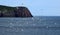 Seagulls flying near the majestic Red head cliff