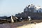 Seagulls in front of the Genoese-built citadel near of the fishing port.