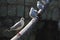 Seagulls sitting on a metal pipe