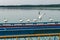 Seagulls are sitting on pier on shore of large lake