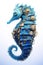 A seahorse made of electronic machinery on a white background. Undersea animals. illustration. Generative AI