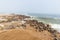 The seal colony at Cape Cross, on the atlantic coast of Namibia, Africa. View on the shoreline and the rough waving ocean