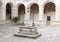 Sealed water well in center courtyard, Basilica di Santa Caterina d`Alessandria, Galatina, Italy