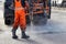 Sealing of asphalt pits by blowing hot mixture