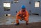 Seaman AB or Bosun on deck of vessel or ship , wearing PPE